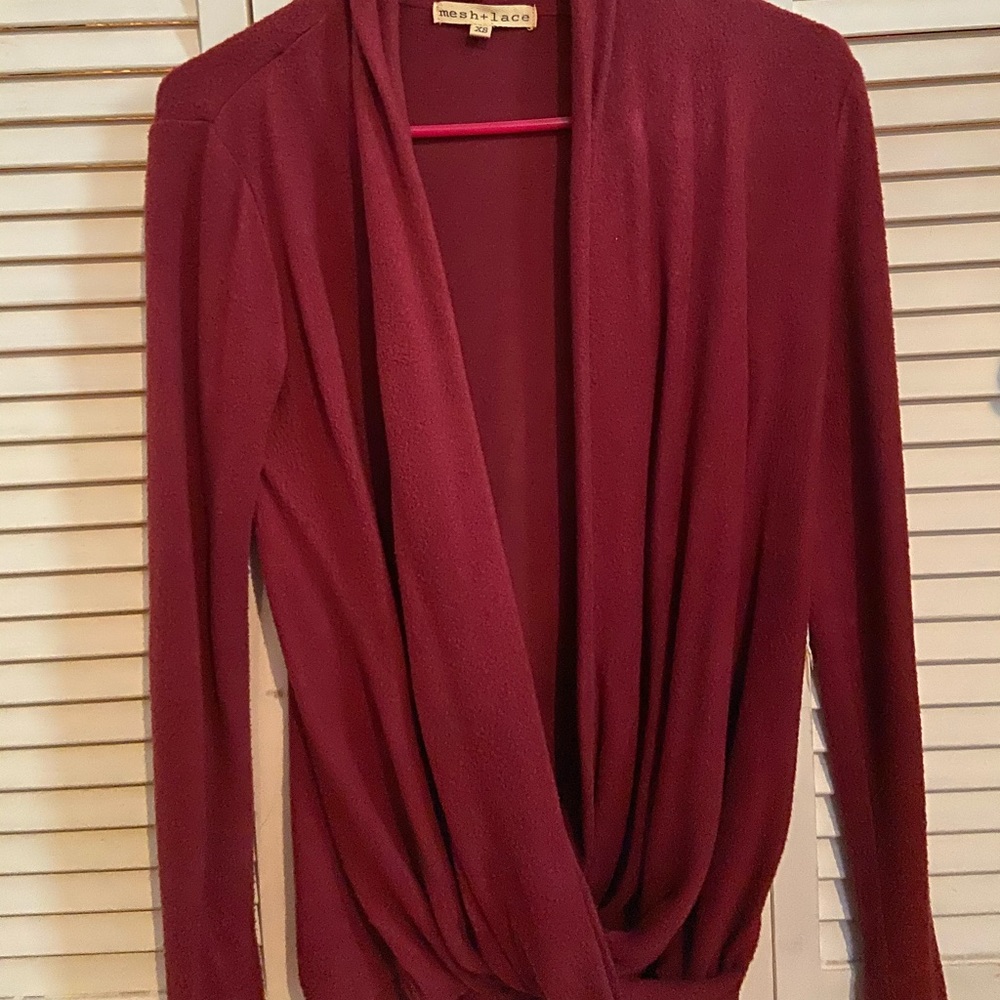 Red draping sweater